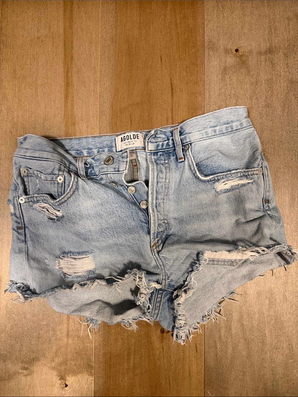 Agolde Light Blue Distressed Denim Cutoff Shorts
